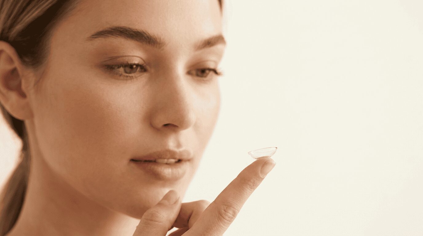 Checking That A Contact Lens Forms A Bowl Shape On The Fingertip Before Insertion